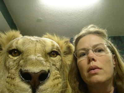 [Me and a taxidermied lion.]
